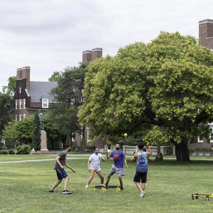 Group of students with a roundnet and ball