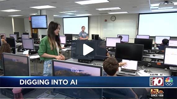 A screenshot of a channel News 10 NBC story showing high school students working in one of the University of Rochester's computer labs.
