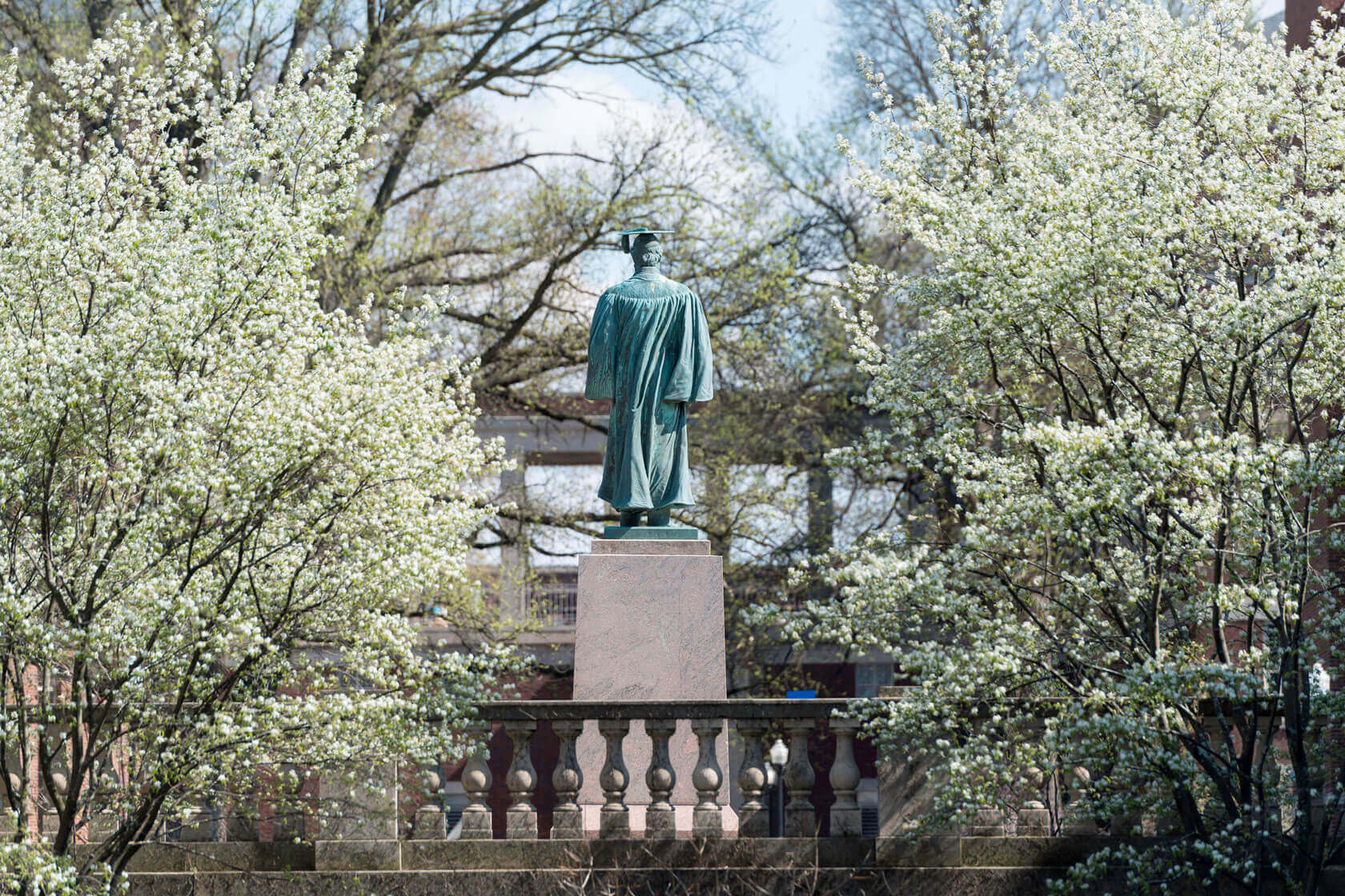 Statue of Anderson on the Quad at spring