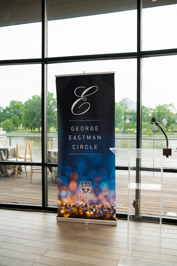 GEC event banner in front of window