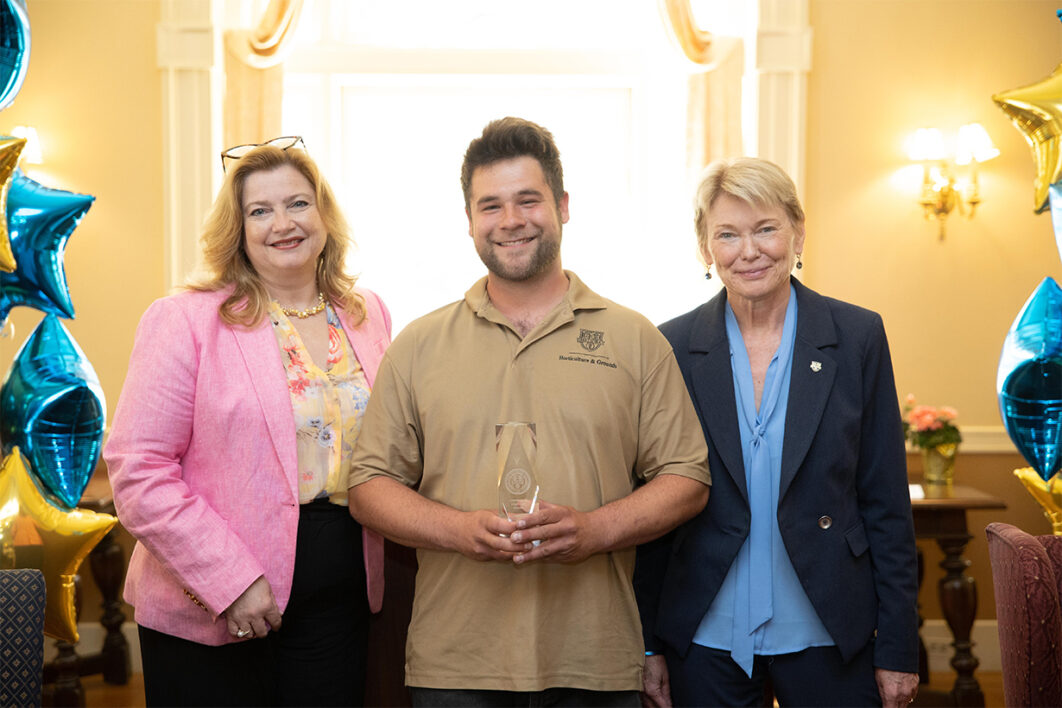 Michael Chudyk, groundskeeper, support operations, Facilities and Services, receives the President's Spotlight Award.