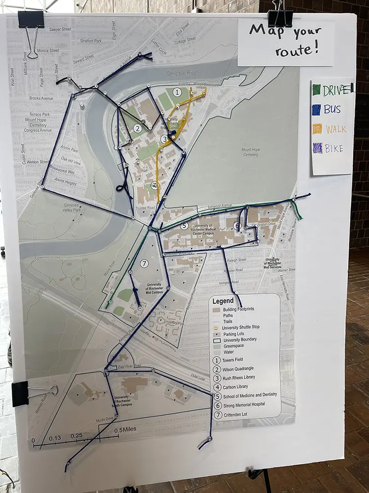 Close up of map displaying bus and walking routes at a pop-up event in Wilson Commons.