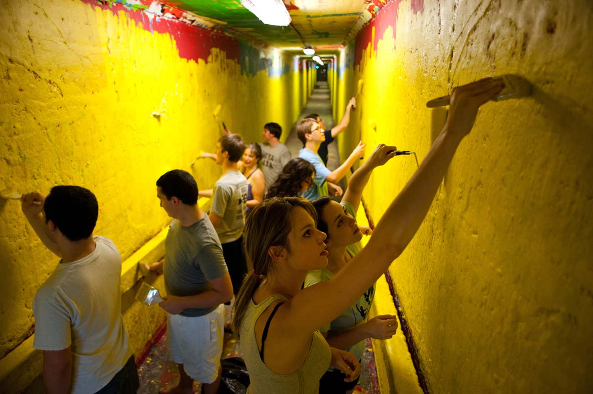 students painting the tunnels