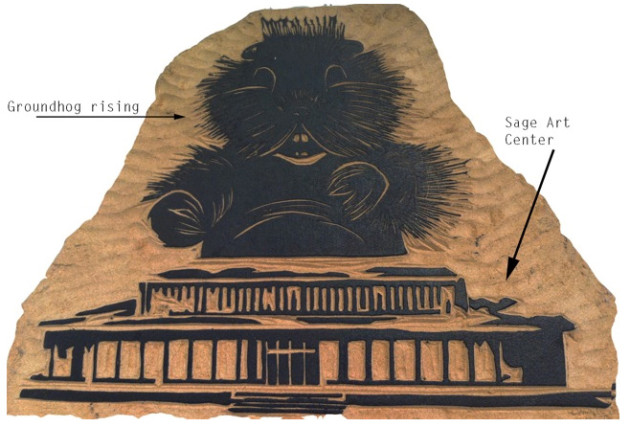 woodcut of a groundhog rising from the top of Sage Art Center