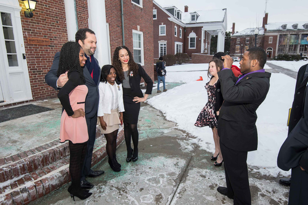 Benjamin Jealous poses for a photo with Rochester students