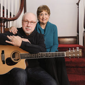 David ’68 and Amy Zimmerman Freese ’71 pose with guitar