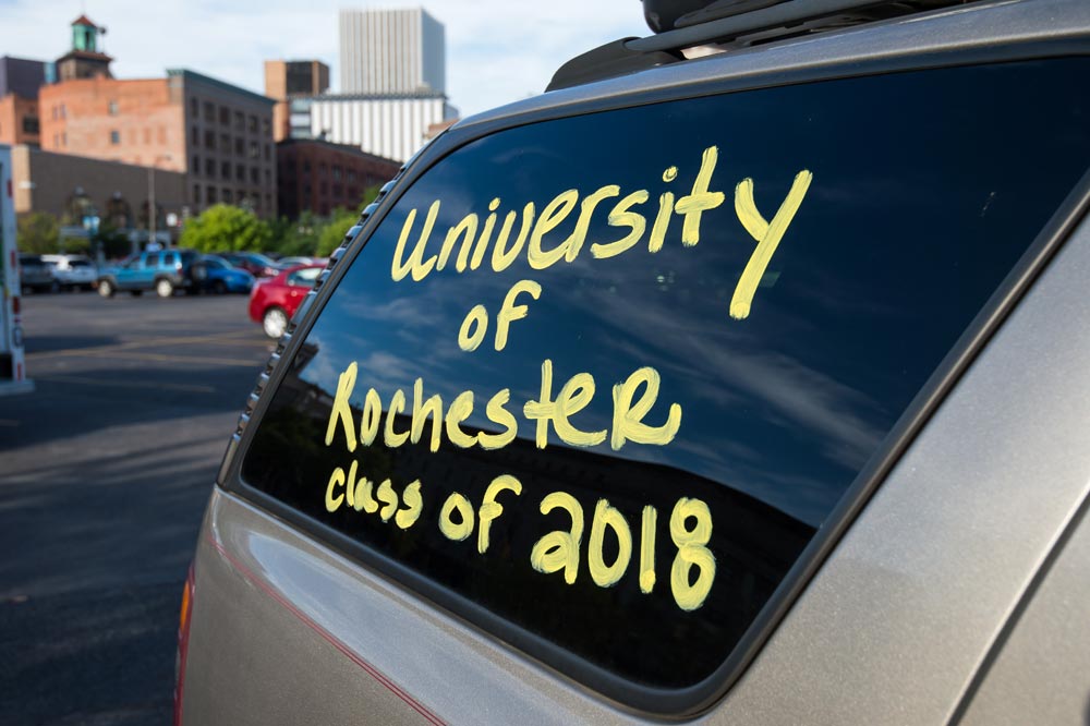 Window of car reads University of Rochester Class of 2018