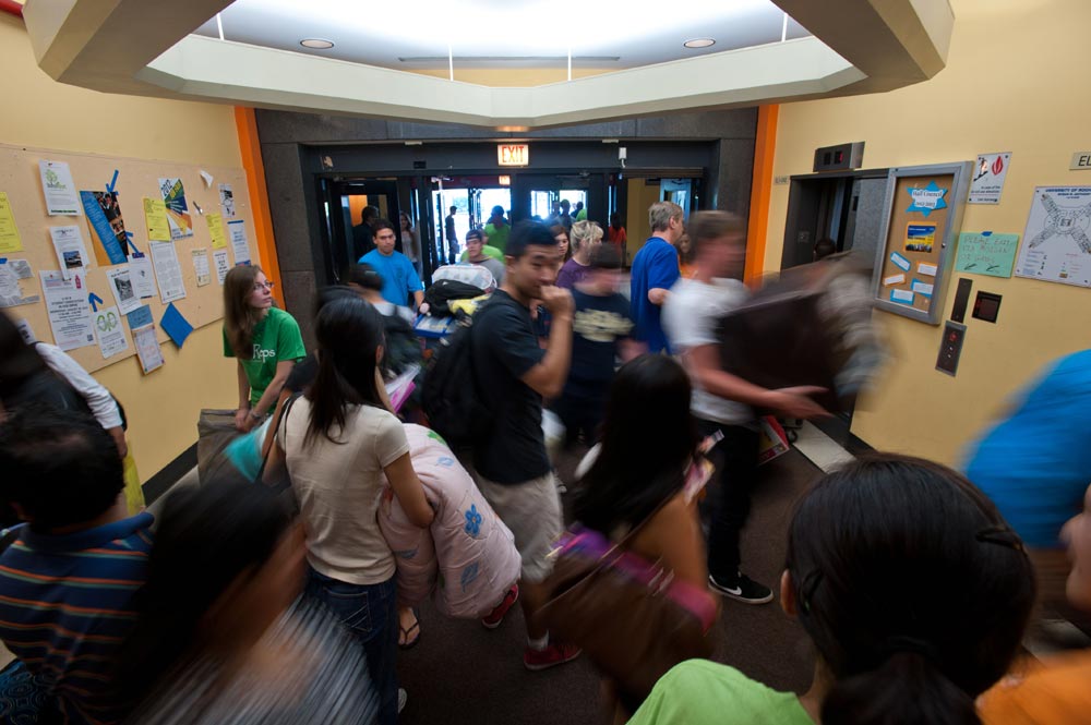 out-of-focus shot of swirling activity around the elevators in Susan B. Anthony Hall