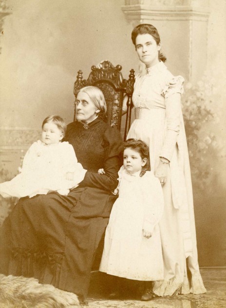 historic photo of Susan B. Anthony with Rachel Foster Avery and her family