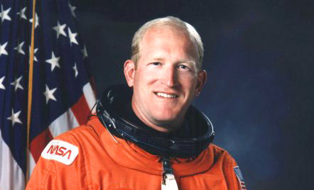 man in orange astronaut suit