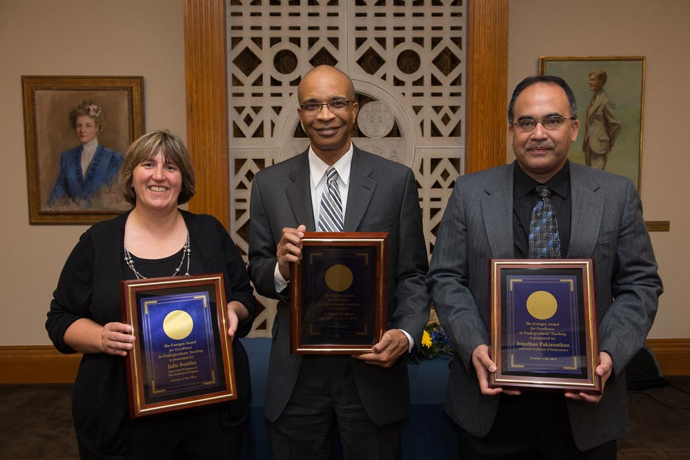 Julie Bentley, Jeffrey Tucker, and Jonathan Pakianathan holding their teaching awards 