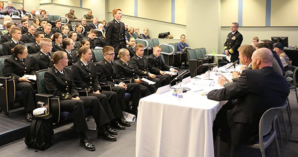 lecture class with NROTC cadets asking questions to a panel