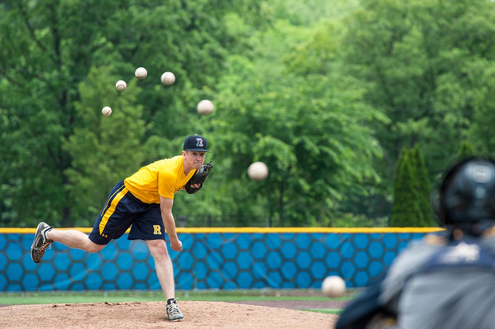 baseball pitcher throws a curveball