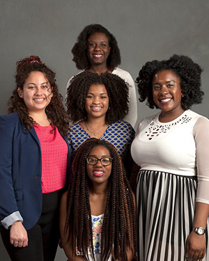 Five women, members of the Black Students' Union