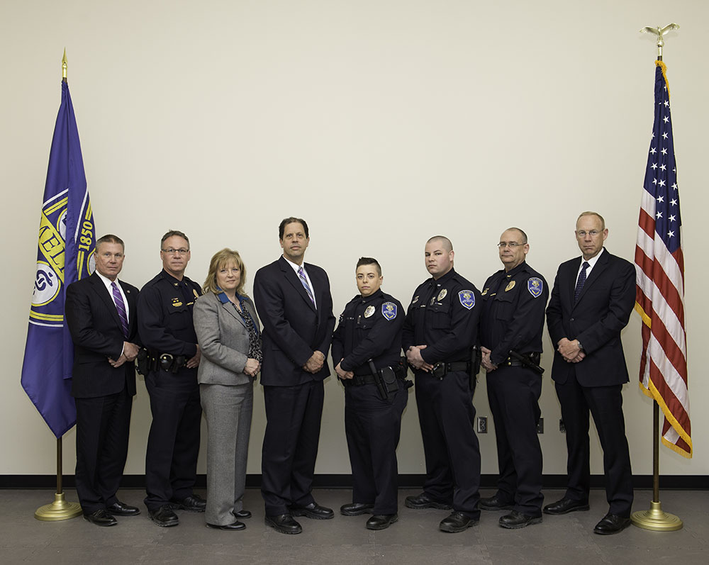 The Department of Public Safety team receiving the Meliora Award include: (from left) Deputy Chief Gerald Pickering, Commander Michael Epping, Investigator Lorraine Strem, Commander James Newell, Officer Tiffany Street, Officer Michael Fitzgerald, Commander Dana Perrin, and Chief Mark Fischer.