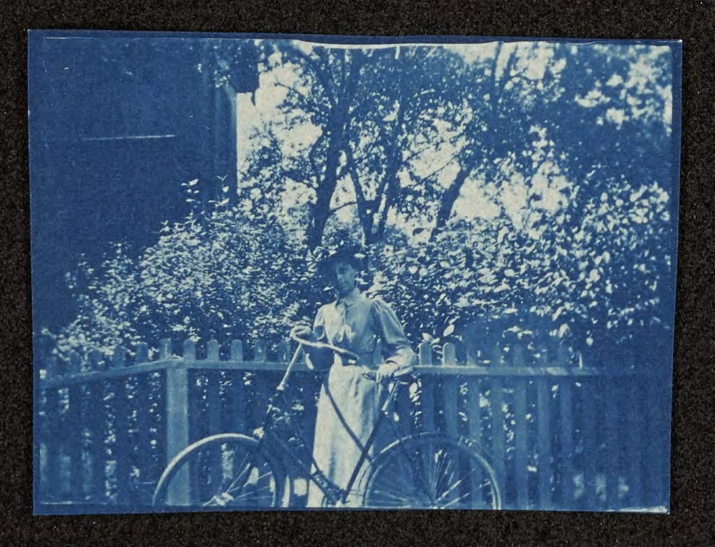 May Bragdon and her bicycle, Diana, in August 1895.