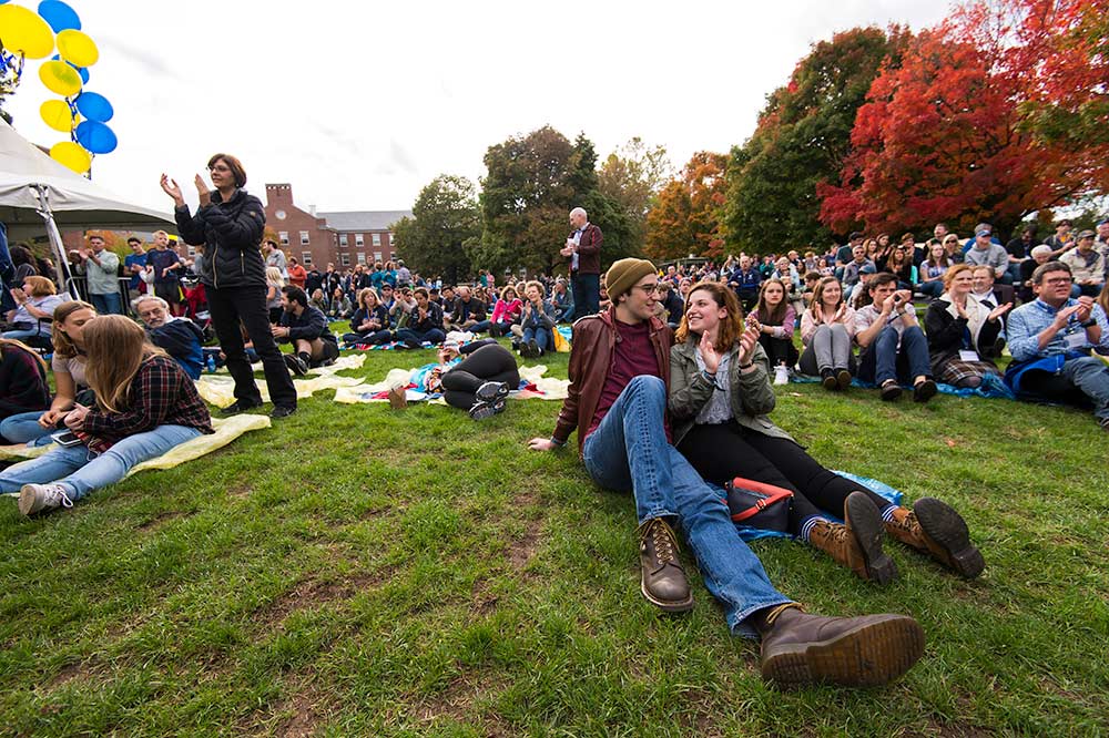 people sitting on the quad listening to a concert