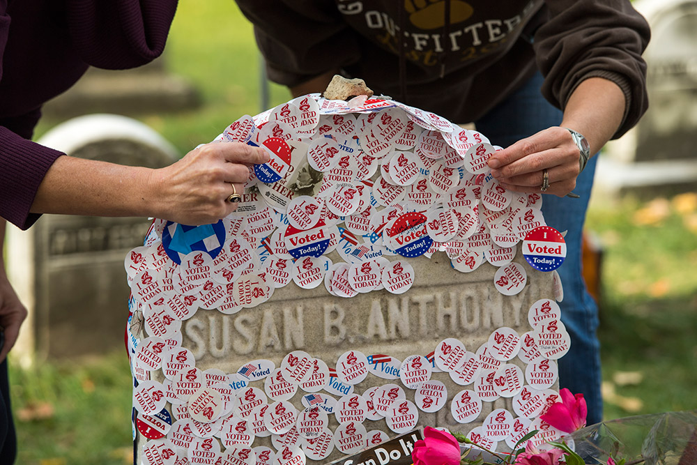 I VOTED stickers cover gravestone of Susan B. Anthony