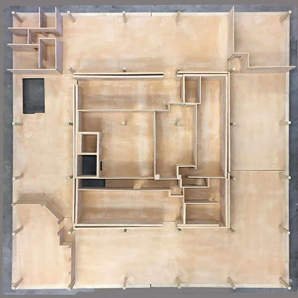 plywood replica of floor plan from Sage Art Center