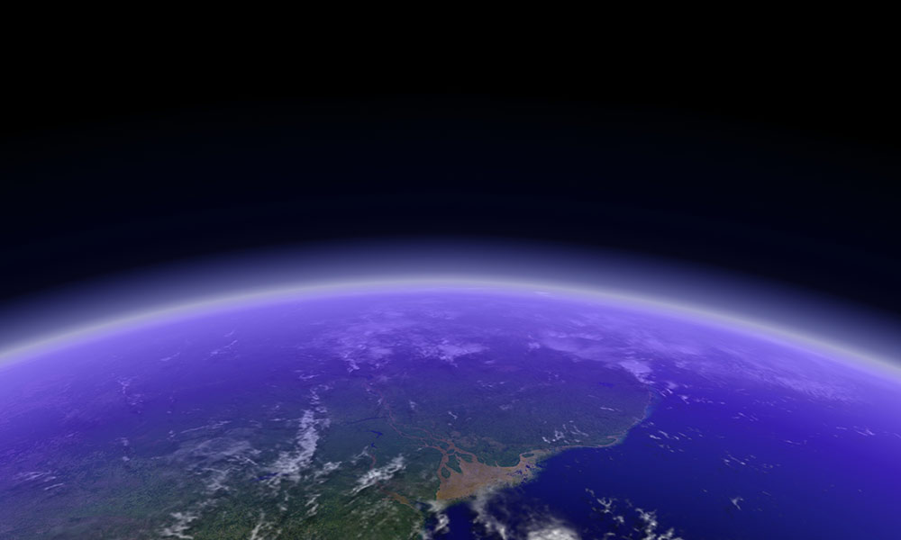 View of Earth from space surrounded by a purple luminescent glow.