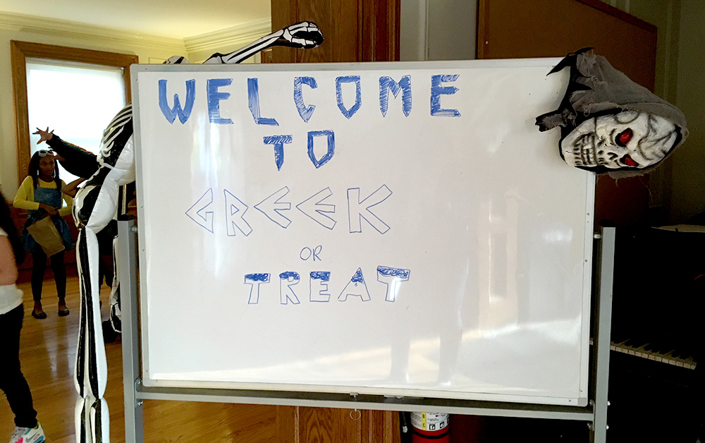sign reads WELCOME TO GREEK OR TREAT