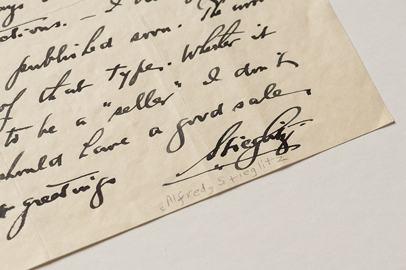 small fragment of handwriting with the signature A. STEIGLITZ
