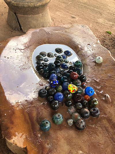 colorful beads in a water fountain