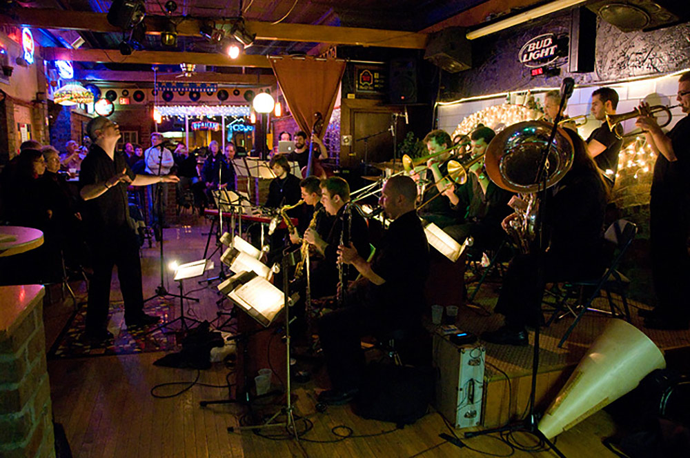 group of musicians performing in a bar