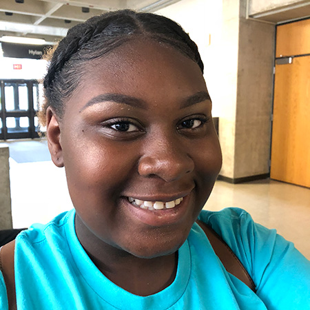 Upward Bound Rochester student smiling for the camera