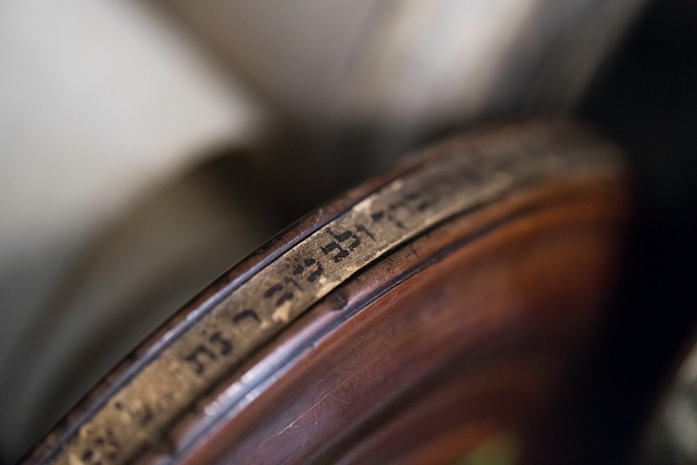 close-up of Hebrew text written on the side of a scroll