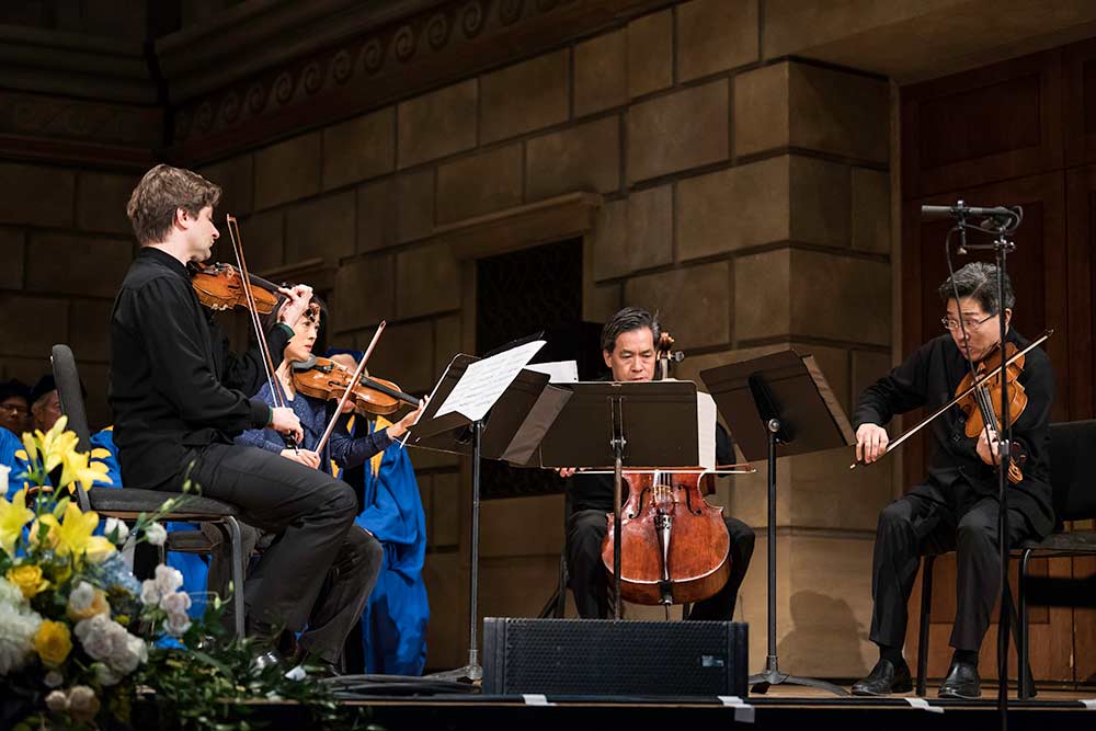 string quartet performs on stage