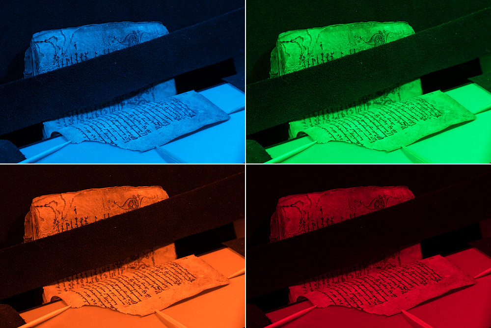 four images side by side of a books scanned with blue light and then scanned with green light as part of the multispectral imaging process.