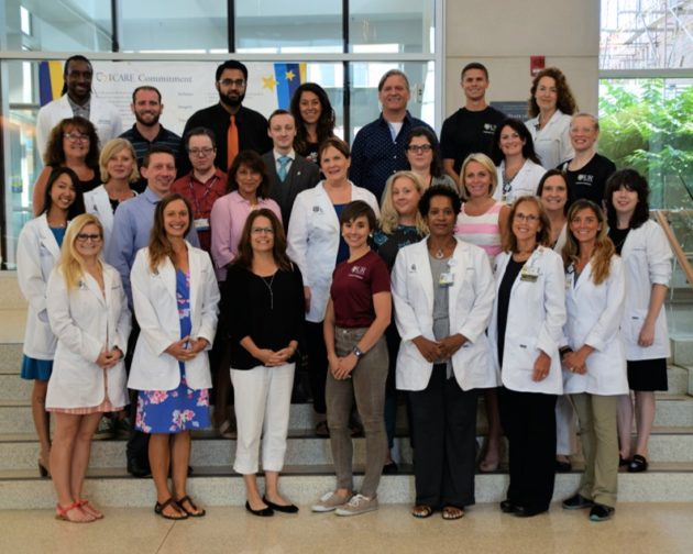 group photo of employee wellness team