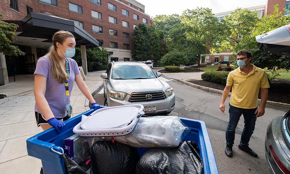 student and parent moving in