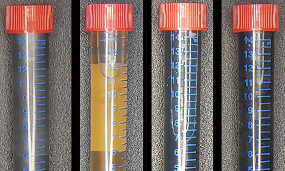 Close-up of four vials of graphene materials.