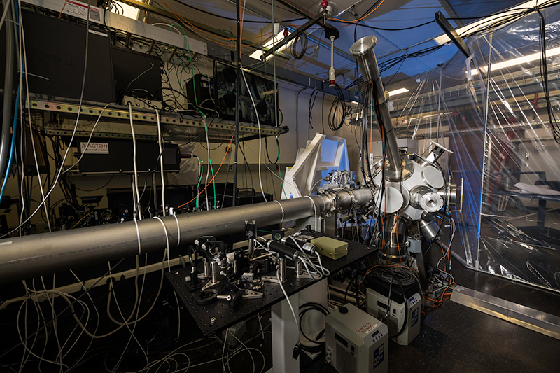 lasers and optical equipment inside a lab. 