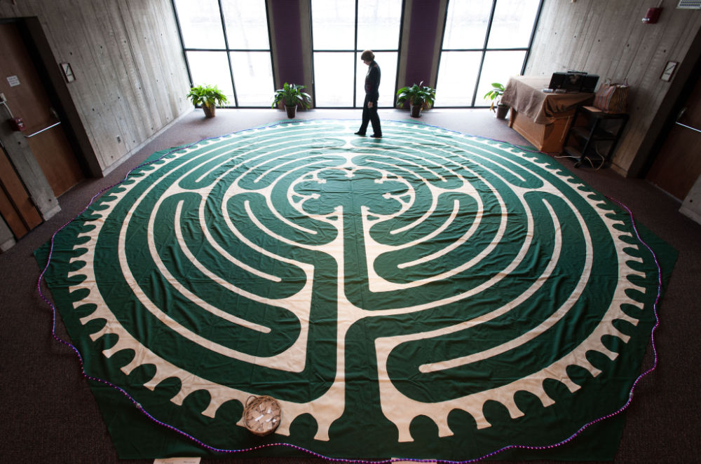 Person walks a chapel labyrinth to practice mindfulness.