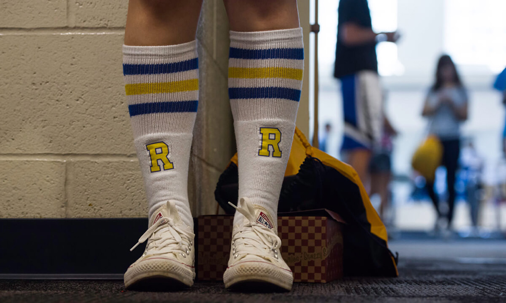 close of photo of student wearing Rochester athletic socks.