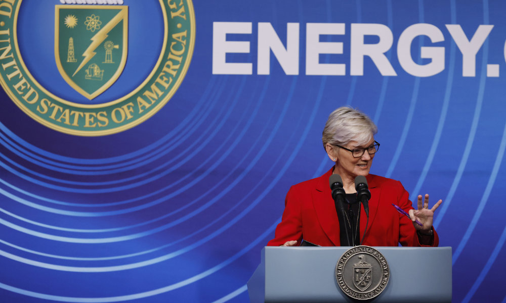Energy Secretary Jennifer Granholm speaks at a podium.