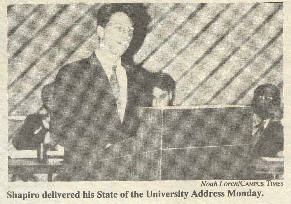 Scan of Campus Times newspaper photo showing Josh Shapiro at a podium with the headline beneath reading "Shapiro delivered his state of the University address Monday."