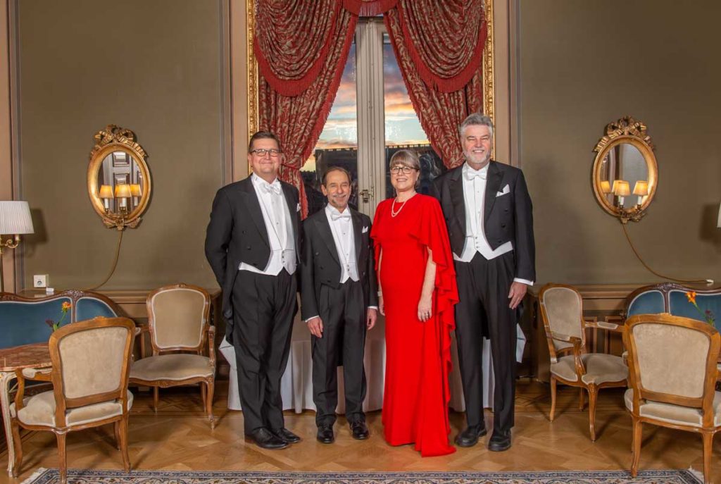 Scott Carney, Richard Feldman, Donna Strickland, and Michael Campbell at the Nobel ceremonies