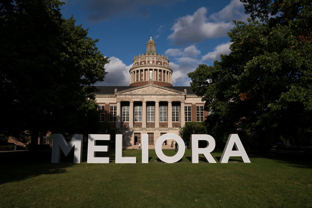 Giant letters that spell out "Meliora" in front of Rush Rhees Library