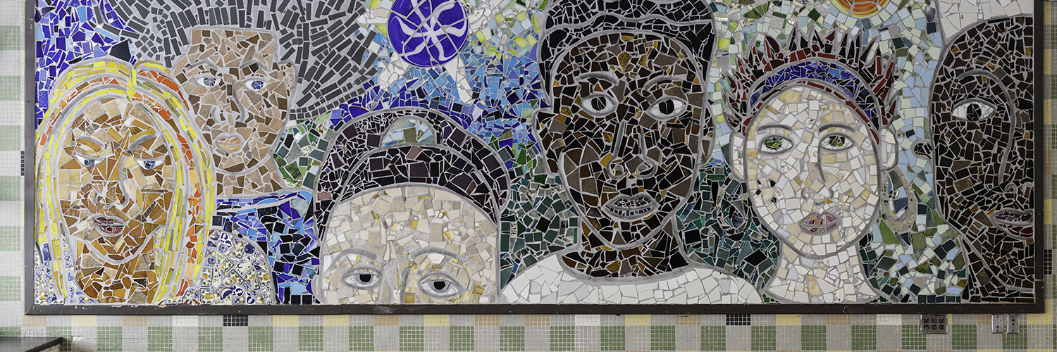 Mosaic of multicultural faces in the lobby of East High